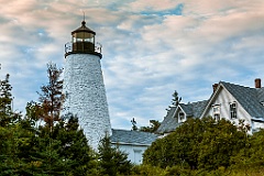 Dramatic Clouds From Sunset Behind Dice Head Light in Maine